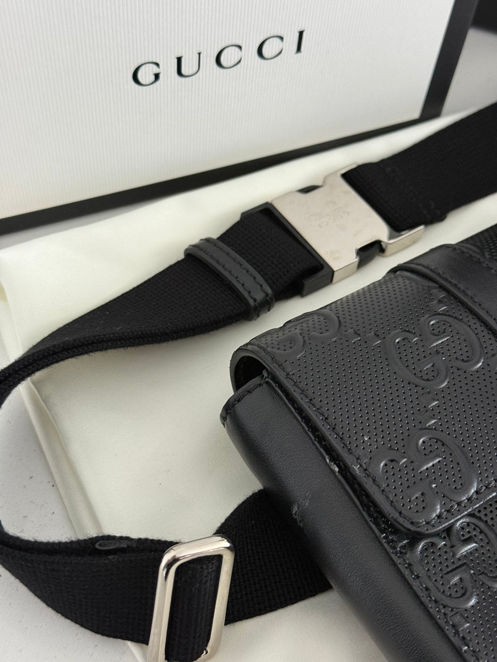 Gucci GG Embossed Perforated Double Belt Bag